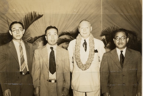 Four men posing for a photograph (ddr-njpa-1-2451)