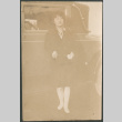 Woman leaning on car (ddr-densho-523-17)