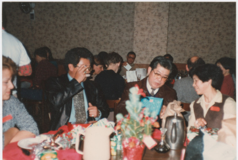 Group seated at tables (ddr-densho-422-569)