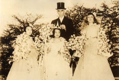 Three girls wearing gowns and flowers (ddr-njpa-4-2516)