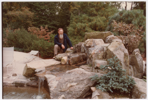 Kaneji Domoto with finished pool waterfall (ddr-densho-377-2521)