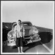 Woman poses with car (ddr-densho-363-182)