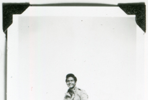 William Kochiyama on rock (ddr-densho-1007-843)