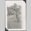Kim Kawashima posing with a bayonet (ddr-densho-328-58)