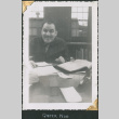 Man sitting at desk (ddr-densho-434-250)