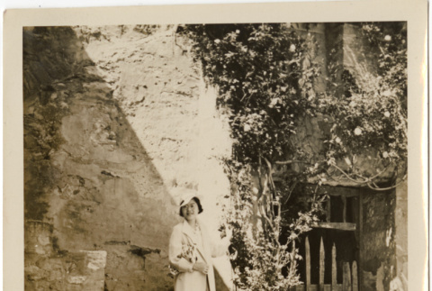 Tomoye (Nozawa) Takahashi standing on stone steps (ddr-densho-426-1789)