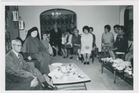 (Photograph) - Image of nun with elderly group of people seated PDF (ddr-densho-330-283-mezzanine-4595652c4b)