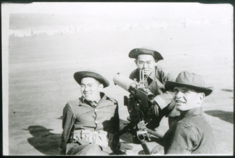 Three soldiers and tripod (ddr-densho-1007-863)