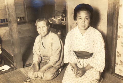 Two women kneeling on tatami mats (ddr-njpa-4-2664)