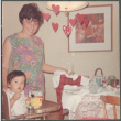 Tina Sakura with baby and new baby clothes (ddr-densho-523-486)
