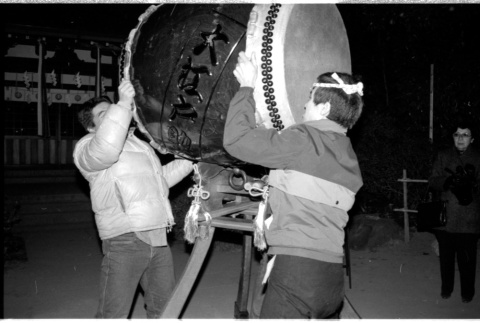 Kenny and one other lifting drum (ddr-densho-1007-1224)