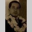 Den Obinata wearing leis (ddr-njpa-4-1670)