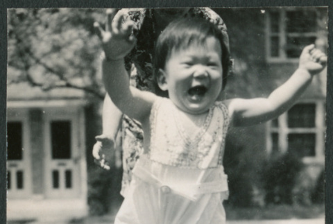 Toddler walking on lawn (ddr-densho-523-185)