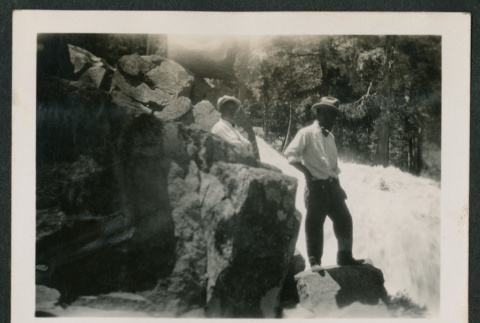 Two men next to rocks (ddr-densho-378-410)