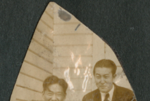 Two men sitting on steps (ddr-densho-316-314)