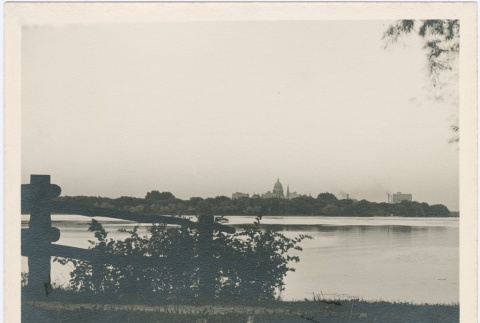 View of a lake with a city in the distance (ddr-densho-338-25)