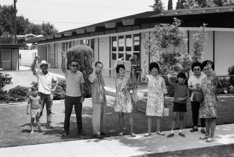 Families waving goodbye to campers (ddr-densho-336-156)
