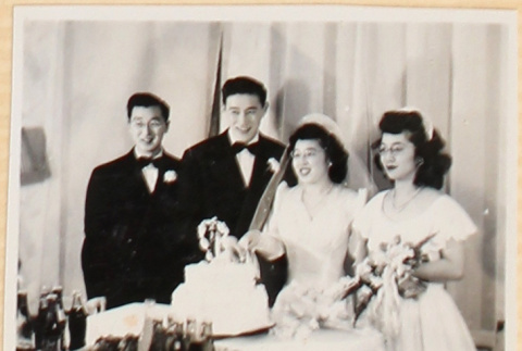 Bride and groom with maid of honor and best man (ddr-densho-522-46)