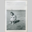 A toddler sitting in a chair (ddr-densho-300-84)