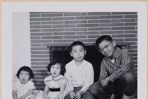 Leslie, Susan and William Shiomi with unidentified boy (ddr-densho-522-539)