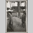 Two men outside tents (ddr-densho-466-120)