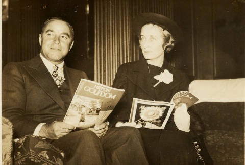 A couple reading Nippon Golfdom (ddr-njpa-1-1928)