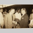 Two men speaking to each other (ddr-njpa-1-1458)