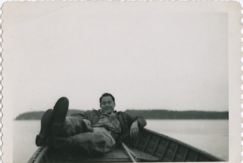 Eiichi Yamashita relaxing in a row boat (ddr-densho-296-99)