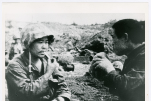Two soldiers, one smoking (ddr-densho-1007-391)