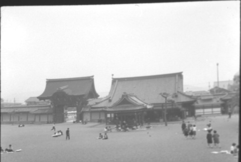 Large field outside gate and building (ddr-densho-426-2330)