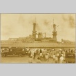 A crowd of sailors and civilians watching the USS Idaho (ddr-njpa-13-68)