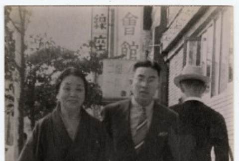 Richard Tsukada and mother along Ginza (ddr-densho-356-20)