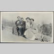 Three women and a man sitting (ddr-densho-355-641)