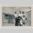 Domoto Family outside barracks (ddr-densho-329-959)