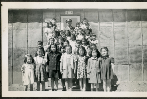Group of children with Ben Kuroki (ddr-csujad-32-22)