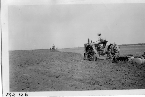 Japanese Americans plowing a field (ddr-densho-37-704)