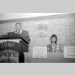 Stanley Diamond speaking, Wilma Chan at table (ddr-densho-1007-531)