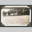 Boardwalk with boat docked in background (ddr-densho-540-62)