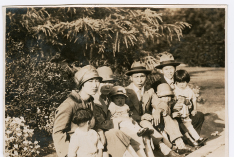 Photo of four adults and four children (ddr-densho-483-57)