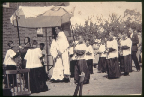 Priest leading procession (ddr-densho-330-20)