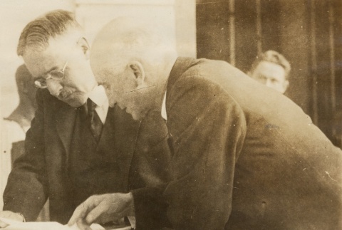 Henry L. Stimson discussing a Document (ddr-njpa-1-1962)