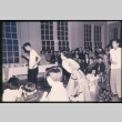 Group of young people in large room (in Maryknoll) (ddr-densho-330-124)