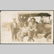 Three men next to car (ddr-densho-293-58)