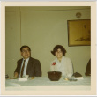Tomoye and Henri Takahashi seated at a table (ddr-densho-426-167)