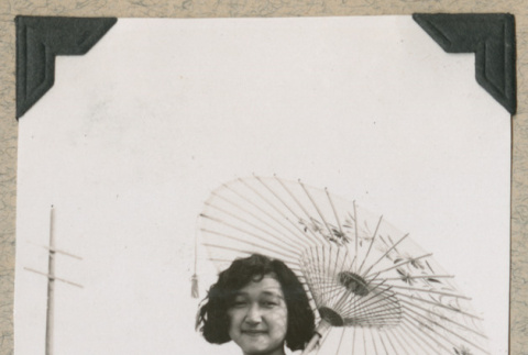 Mary Toshiko Yoshijima in sundress with parasol (ddr-densho-383-189)