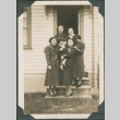Five women and girl posing on steps (ddr-densho-316-371)