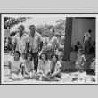 Group poses at picnic (ddr-densho-363-276)