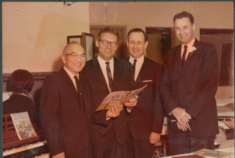 Four men singing (ddr-densho-523-621)