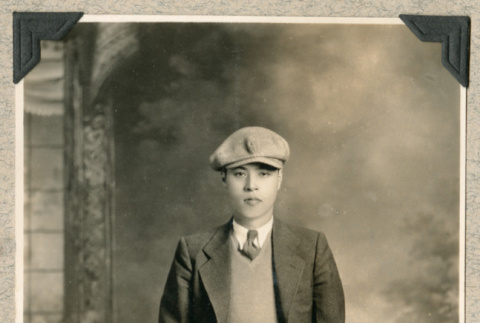 Studio portrait of man in suit and hat (ddr-densho-383-153)