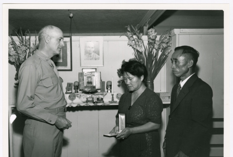 Risaku Kanayo receiving her late son's Silver Star (ddr-densho-1007-313)
